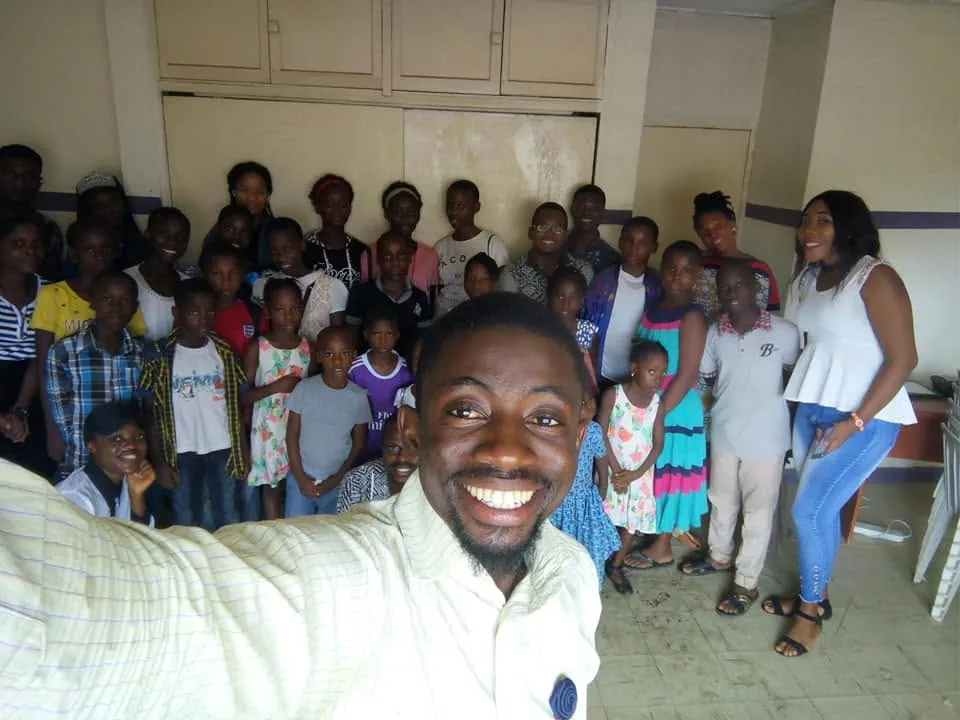 Participants gathered in a hall during a values-based development session.