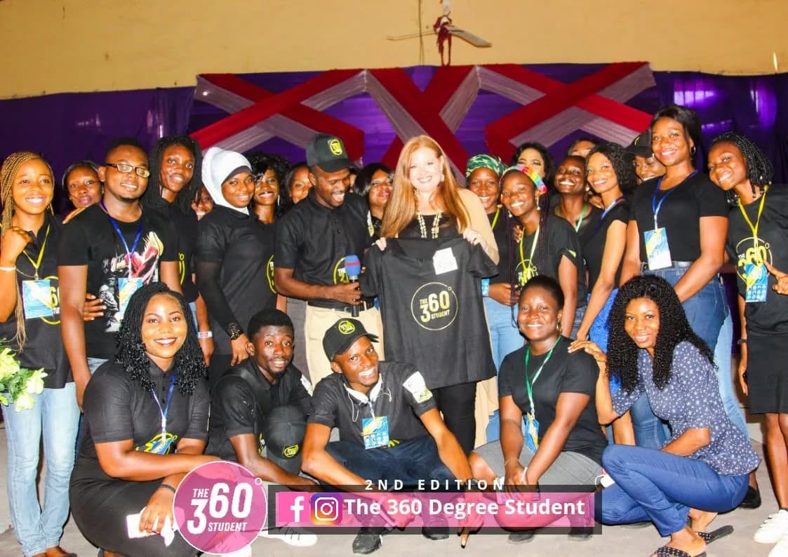 The team gathered with a guest speaker after the conference.